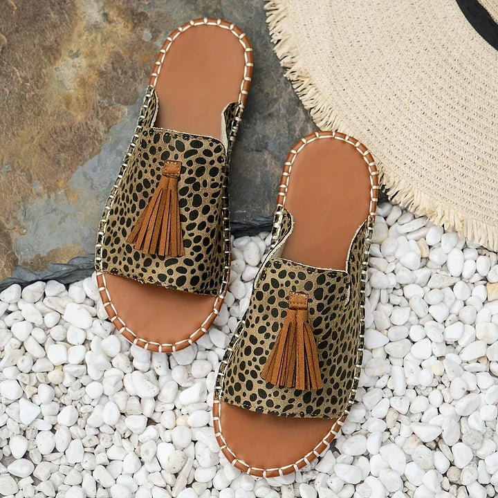 Damen Pantoletten flach Boho mit Quasten – Slip-On für den Sommer | Alma