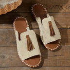 Damen Pantoletten flach Boho mit Quasten – Slip-On für den Sommer | Alma
