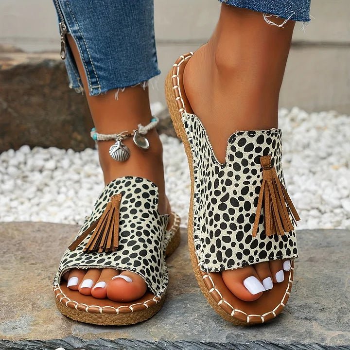 Damen Pantoletten flach Boho mit Quasten – Slip-On für den Sommer | Alma