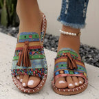 Damen Pantoletten flach Boho mit Quasten – Slip-On für den Sommer | Alma